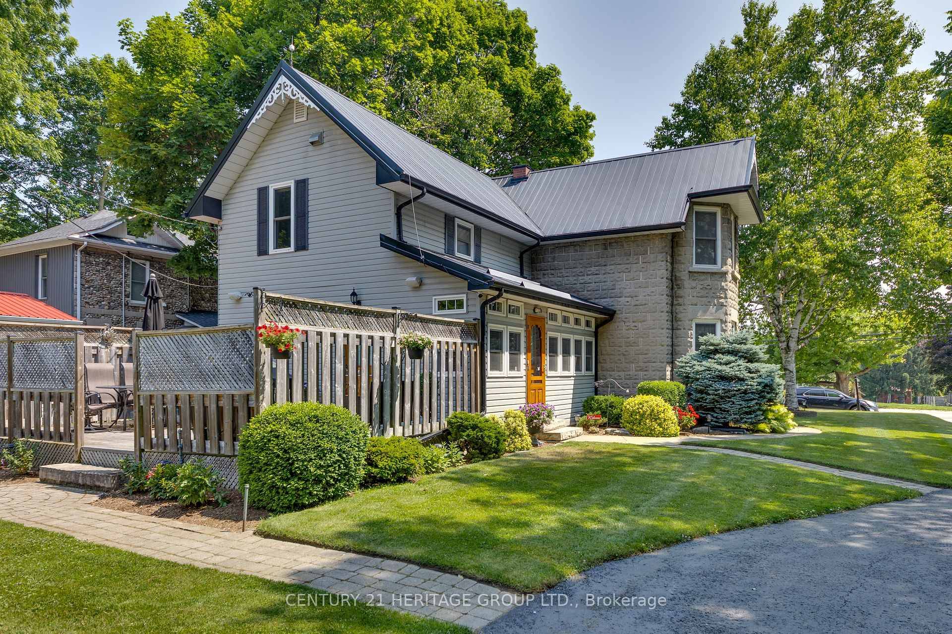 This impressive century home is brimming with charm.