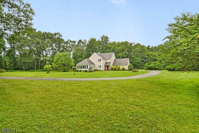 Discover the perfect blend of elegance and comfort in this remarkable Colonial style home, nestled in a serene and private setting.