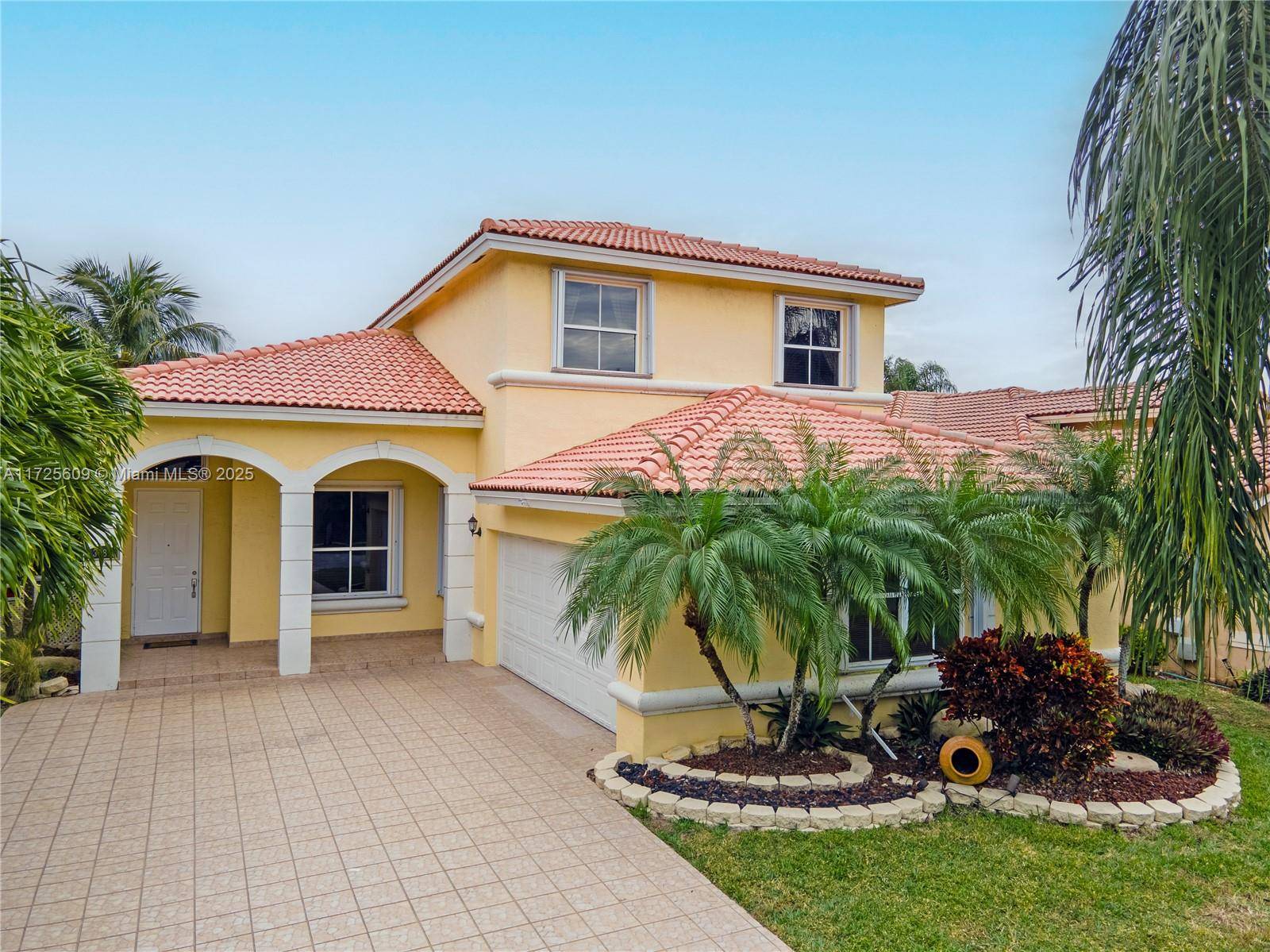Welcome to your dream home in the highly desirable Coco Lakes community, located within walking distance to the beautiful Sabal Pines Park !