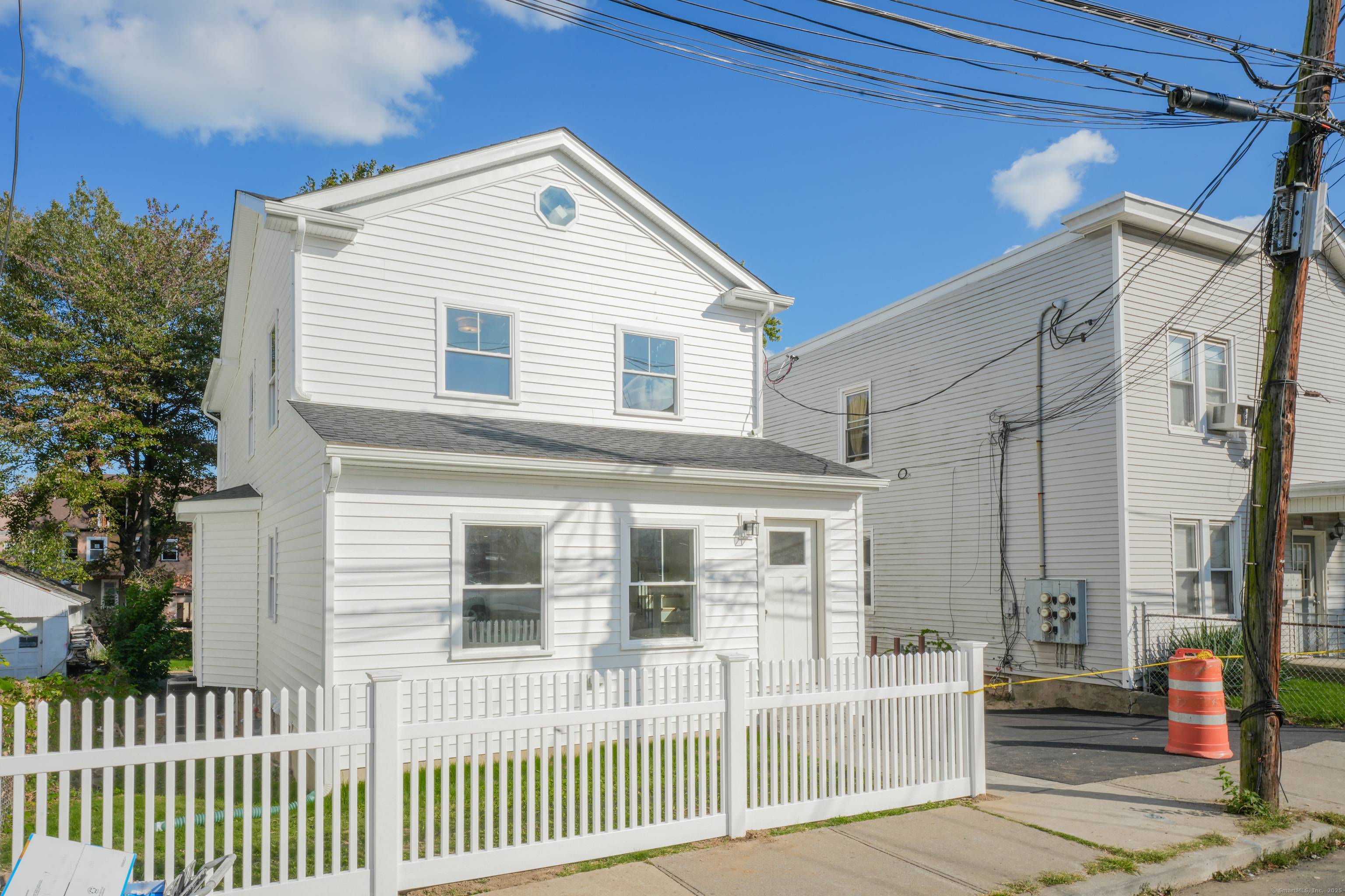 Completely renovated 5 bedroom, 4 bath home with a new addition that expands the living space and enhances functionality, located just minutes from Stamford Hospital.