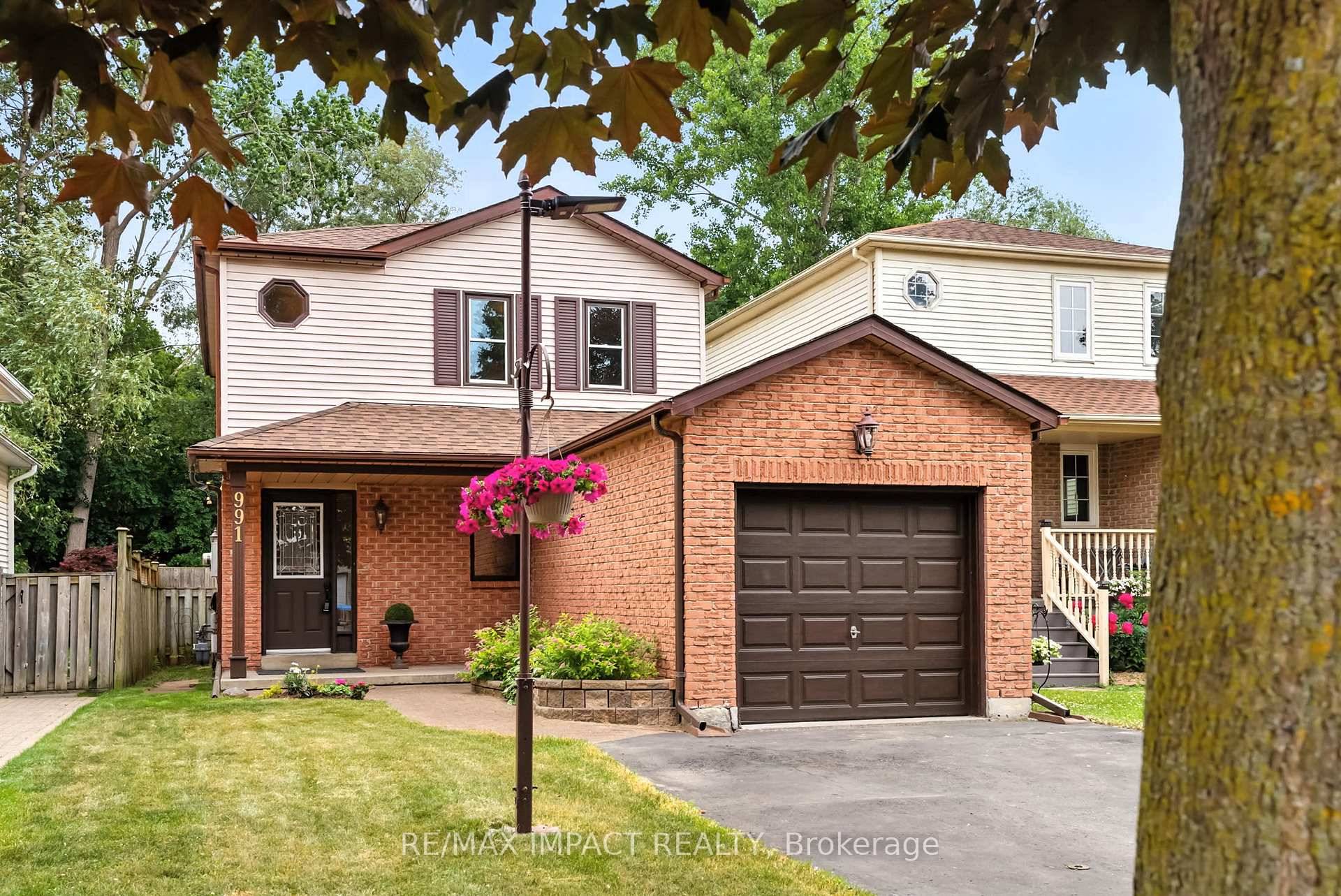 Welcome to this updated home with attached garage nestled in a court location in north east Oshawa and backing onto a treed R A V I N E.