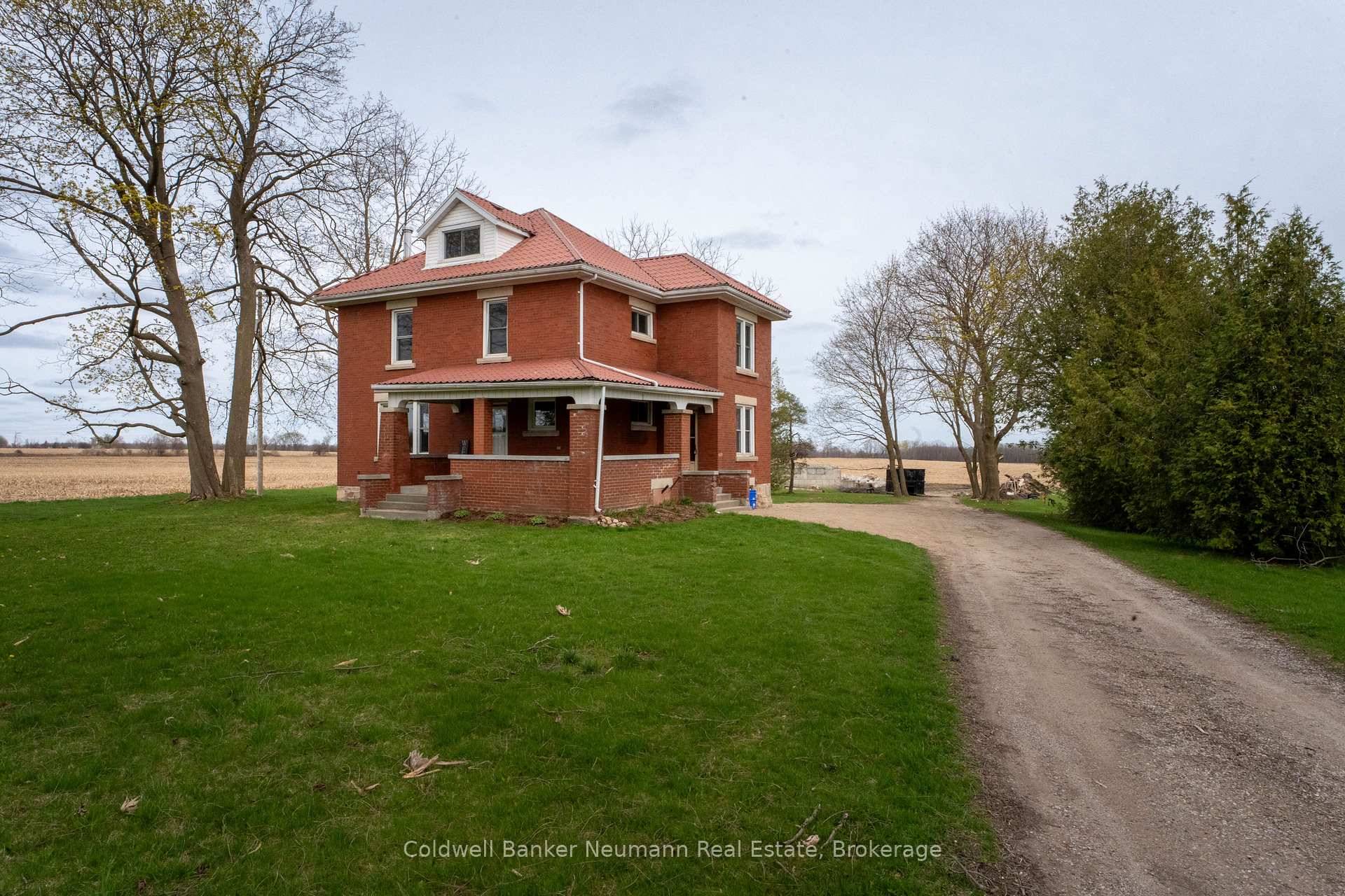 Nestled just off Highway 6 along Sixth Line, this lovely 5 bedroom, 2 bath farmhouse offers the perfect blend of rural charm and modern comfort.