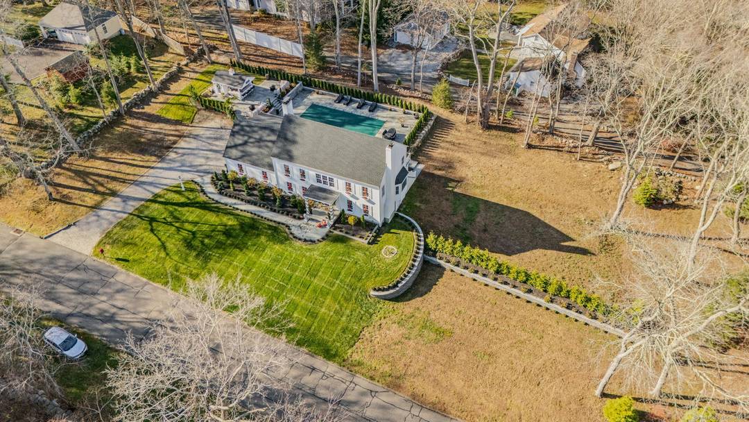 Exquisitely updated remodeled Essex home on the cusp of South Cove with easterly views.