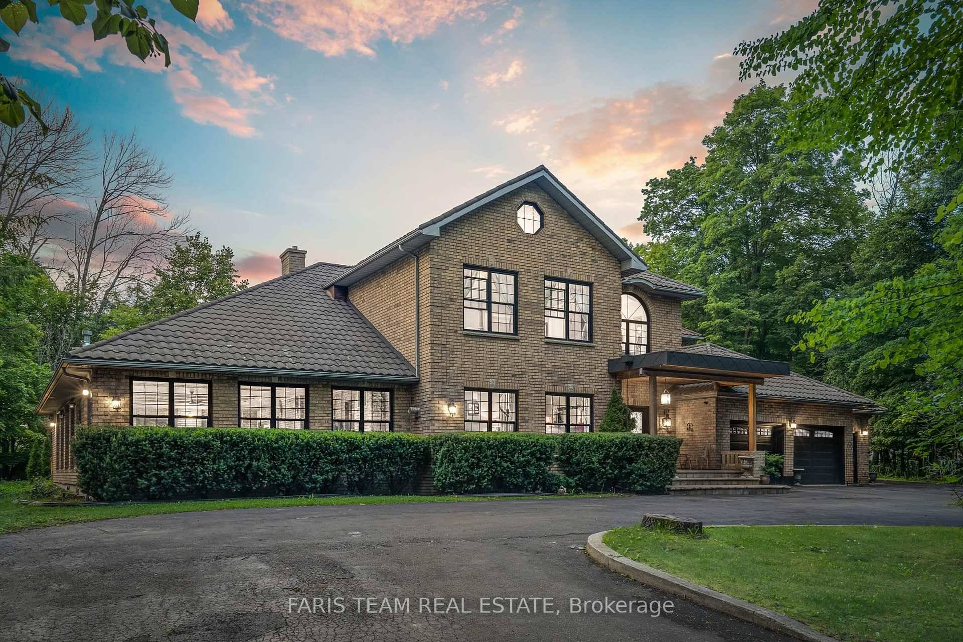 Top 5 Reasons You Will Love This Home 1 Striking custom built residence set on a sprawling 2.
