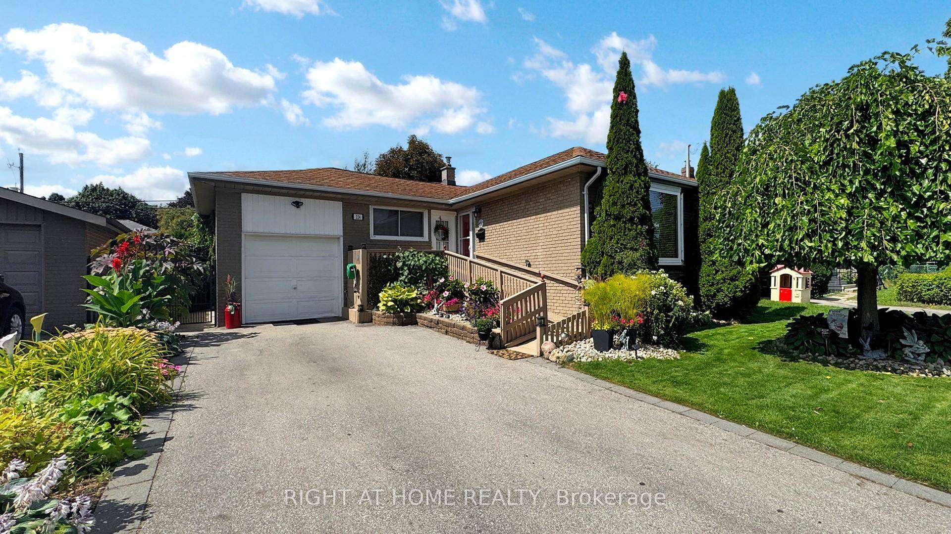 Welcome to this detached raised bungalow with Award Winning Gardens.