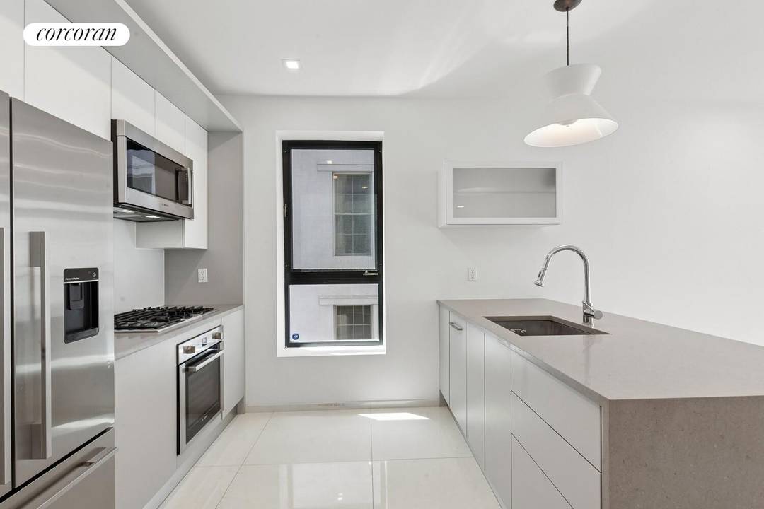 Sleek, sun filled 2 bedroom, 2 bathroom condo in a boutique Brooklyn building, complete with two private balconies and radiant heated floors throughout.