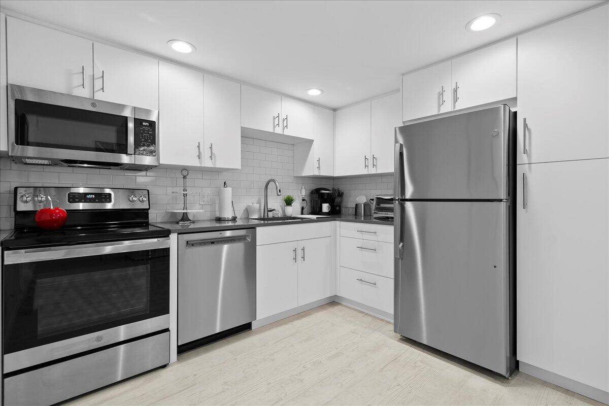 Experience the very best of South Florida living in this impeccably renovated 1 bedroom, 1.