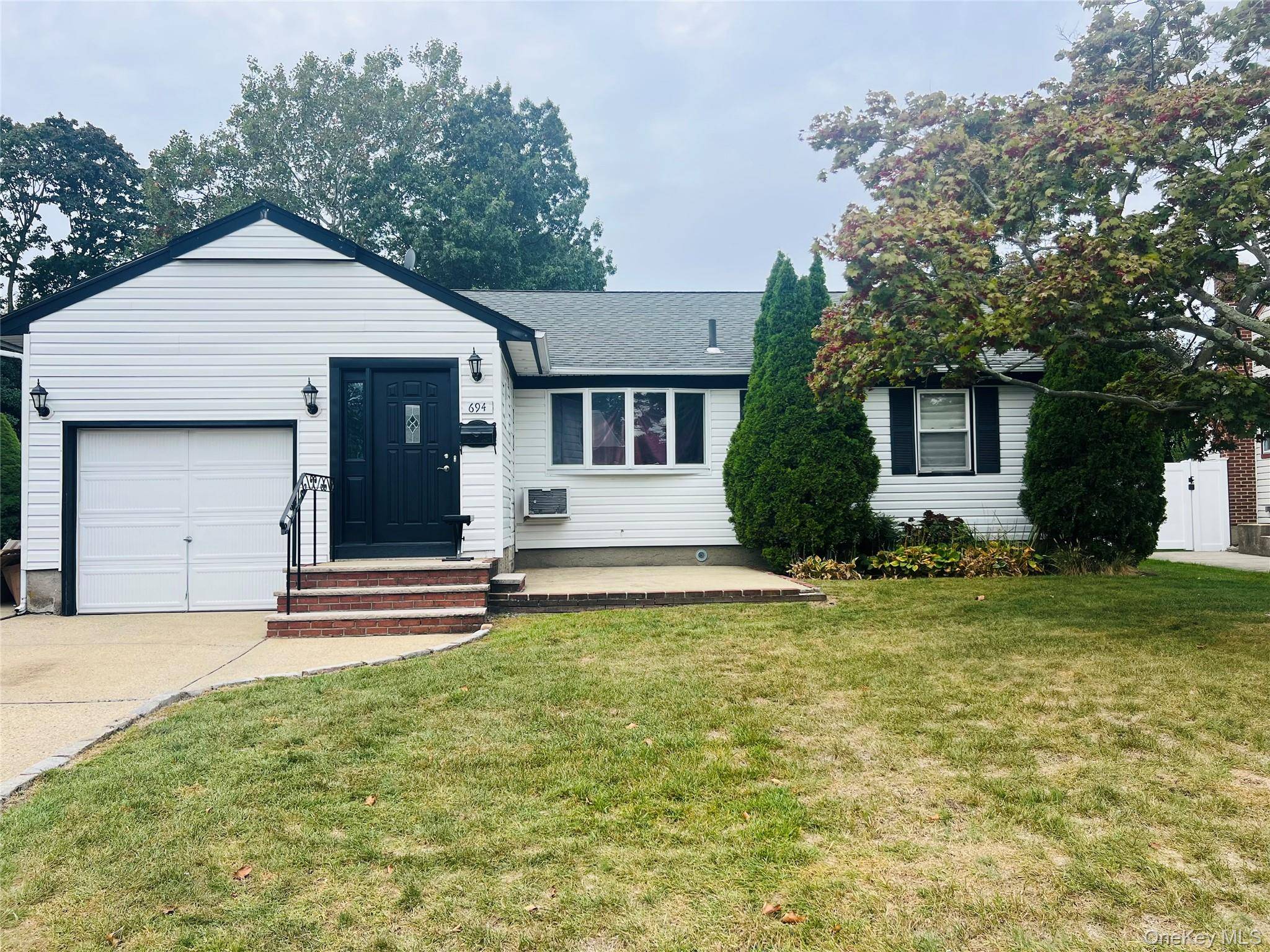 Welcome To This Beautifully Updated One Level Ranch, Featuring Three Comfortable Bedrooms And One Stylish, Renovated Bathroom.