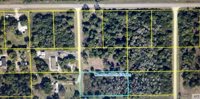 Prime acreage in Montura Ranches located just off Pine Cone Ave.