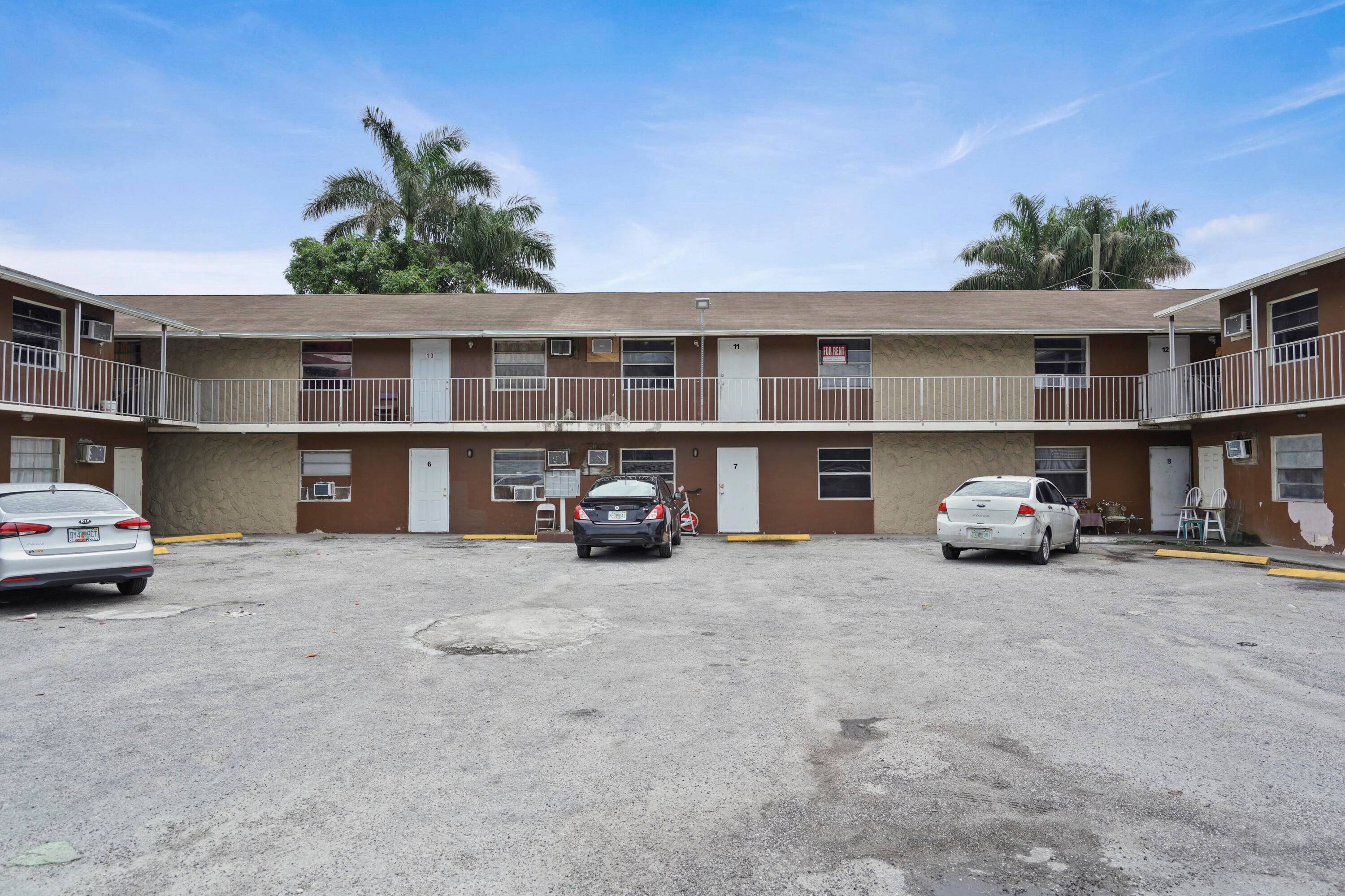 241 NW 11th St is a 16 unit multifamily property made up of two adjacent 8 unit buildings.
