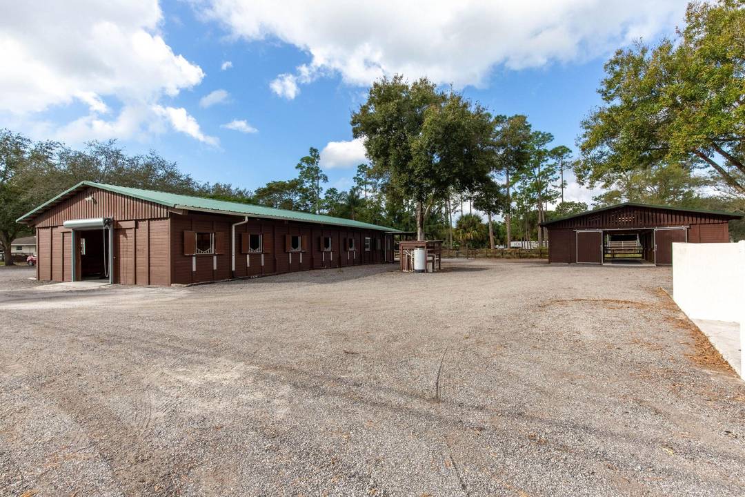 This serene equestrian farm has an amazing location just across Southern Blvd on a paved road and is only about a 10 minute drive to WEF.