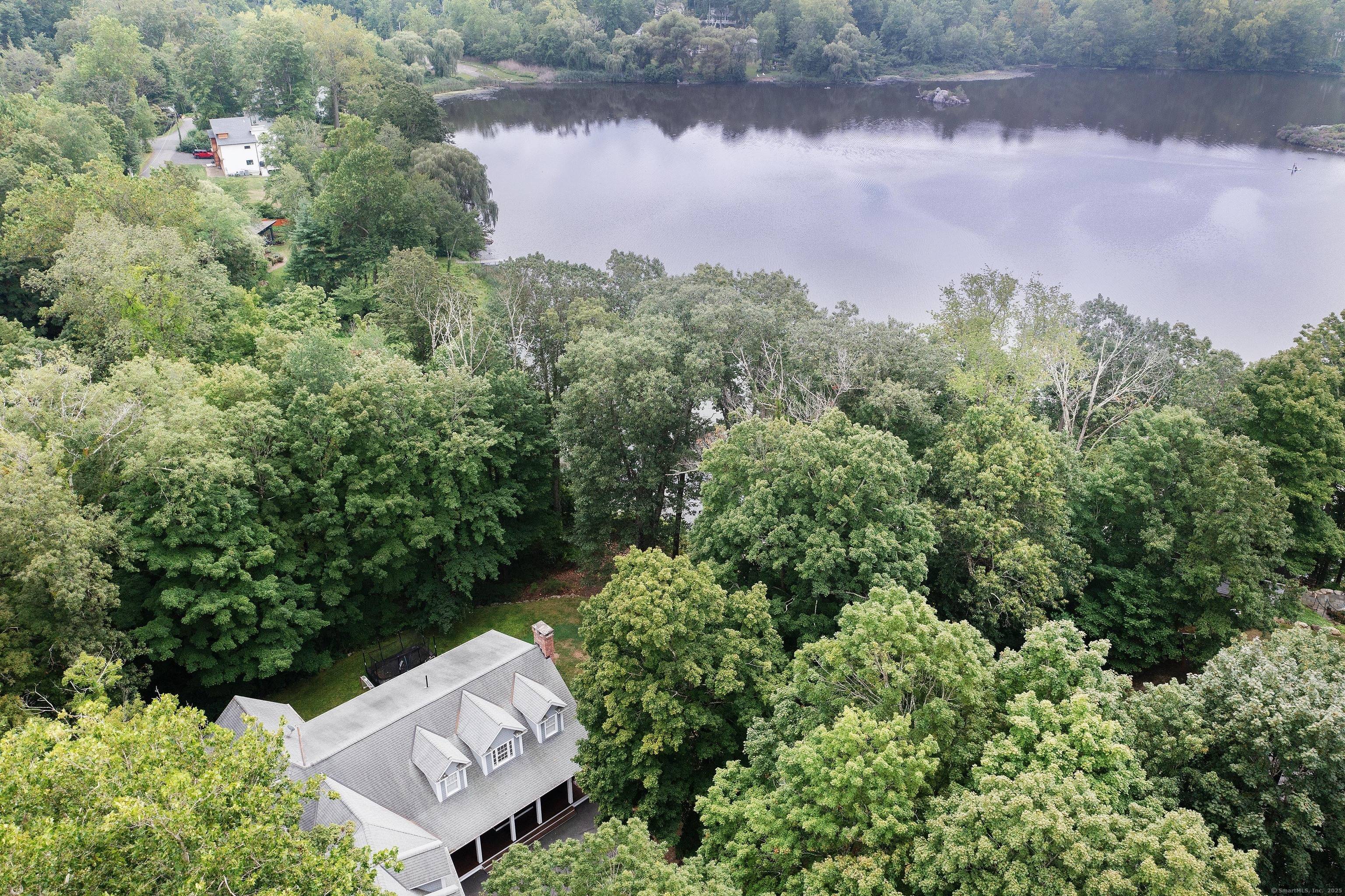 Welcome Home to your own waterfront retreat on Ridgefield's Lake Mamanasco !