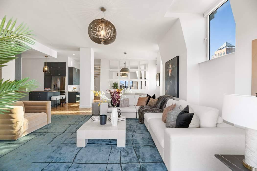 11D is a corner duplex penthouse loft with an interior square footage of 1, 616 and approximate exterior square footage of 1000 over two terraces.