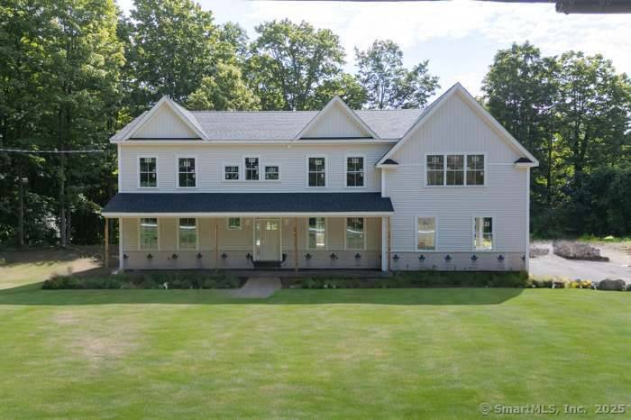 This stunning new construction home has 4 spacious bedrooms and 2.