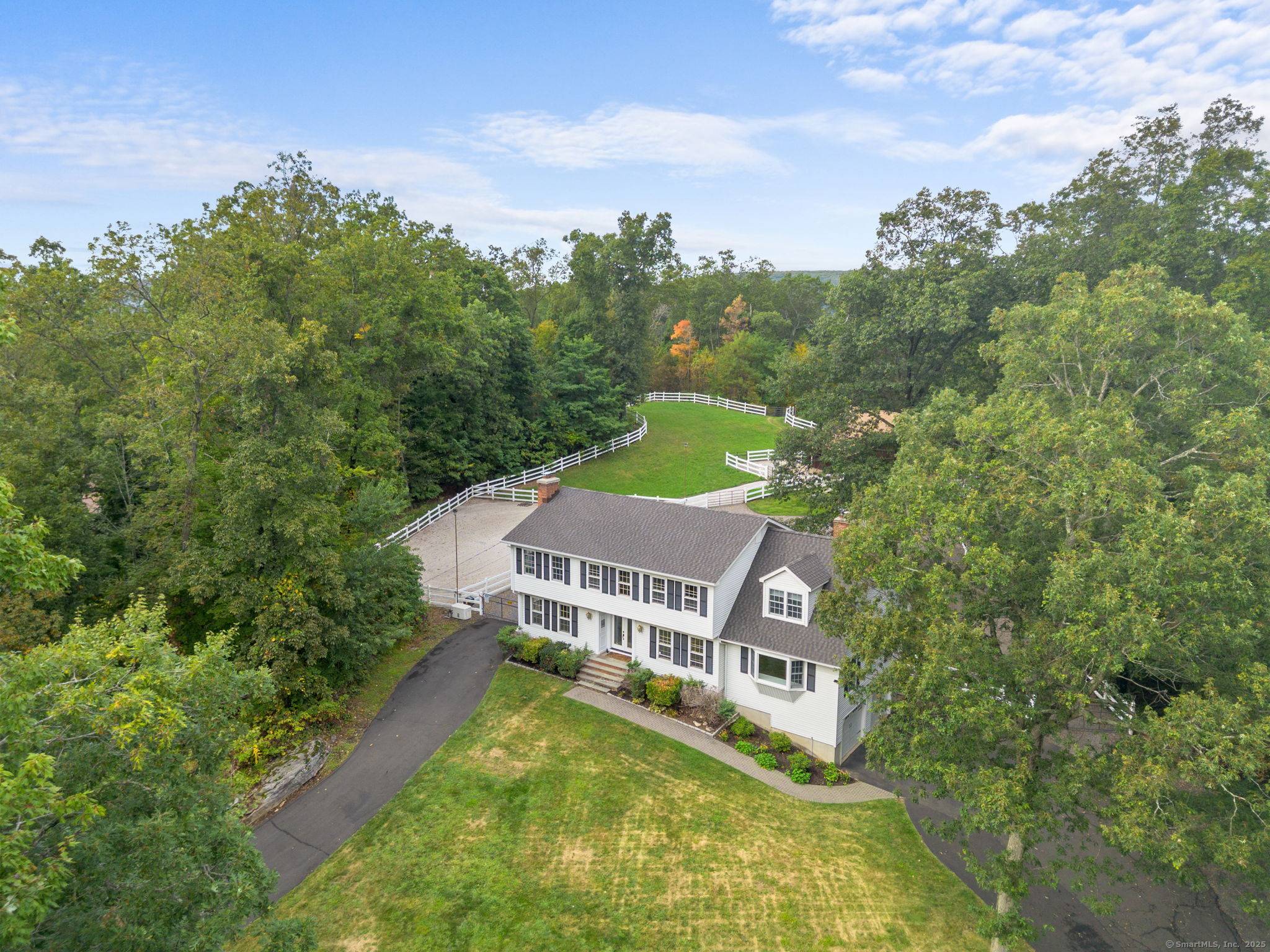 Tucked away at the end of a quiet cul de sac in one of New Fairfield's westside neighborhoods, this exceptional 5.