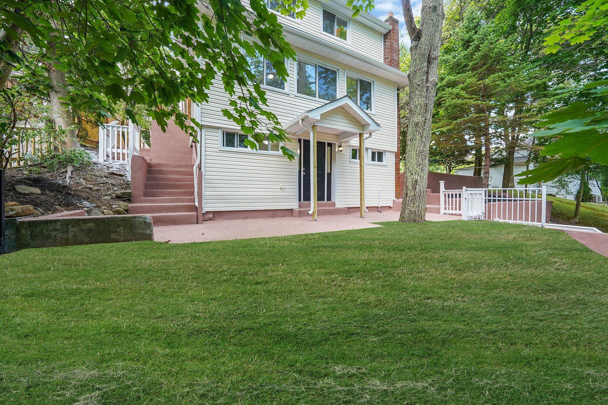 Fully renovated three level home offering modern updates, flexible living space, and quality finishes throughout.