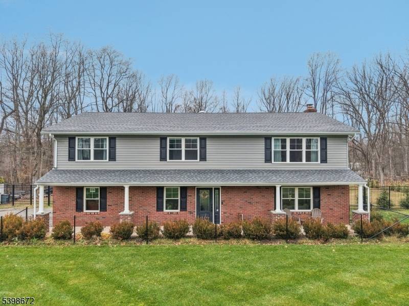 Situated on a flat acre and a half lot, this exceptionally maintained 3 bedroom, 2.