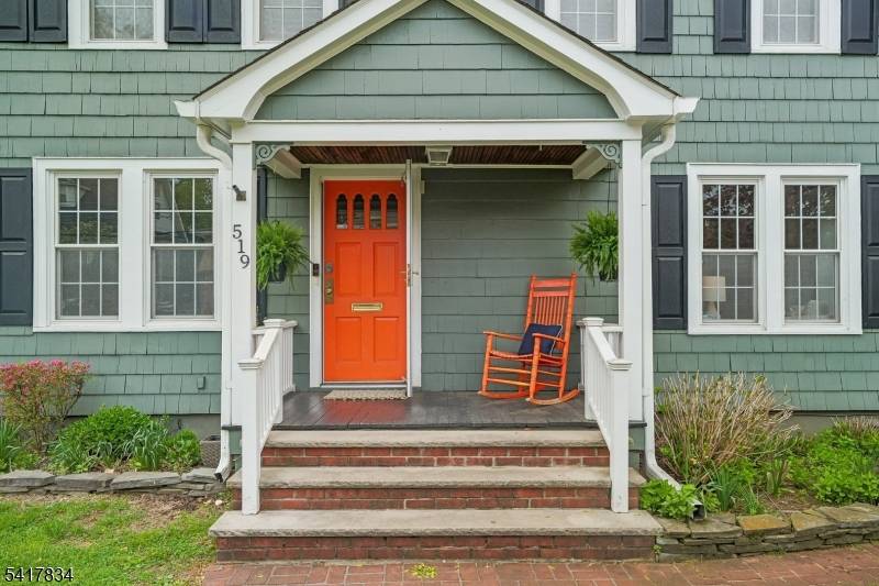 Timeless elegance meets modern comfort in this sun drenched, four bedroom residence nestled on a premiere street in the Spring Garden section of Nutley.
