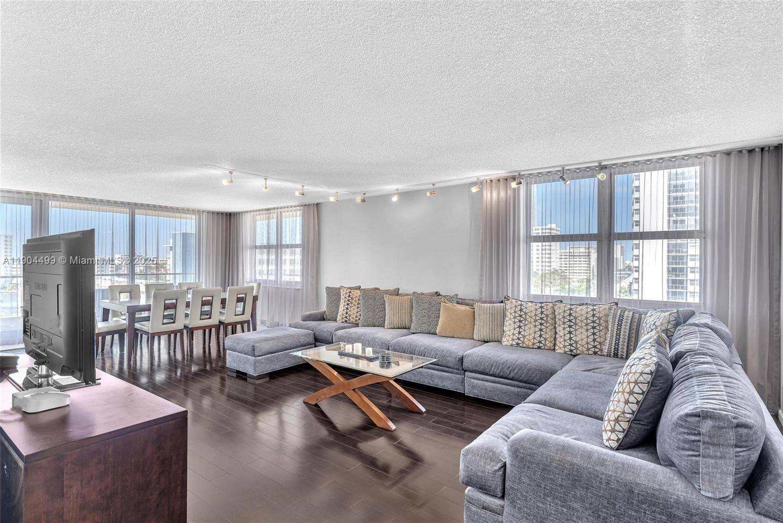 With nearly 2000sf of interior space and 2 custom built rooms in addition to its 2 standard large bedrooms see floor plan in photos, this spacious corner unit is perfect ...