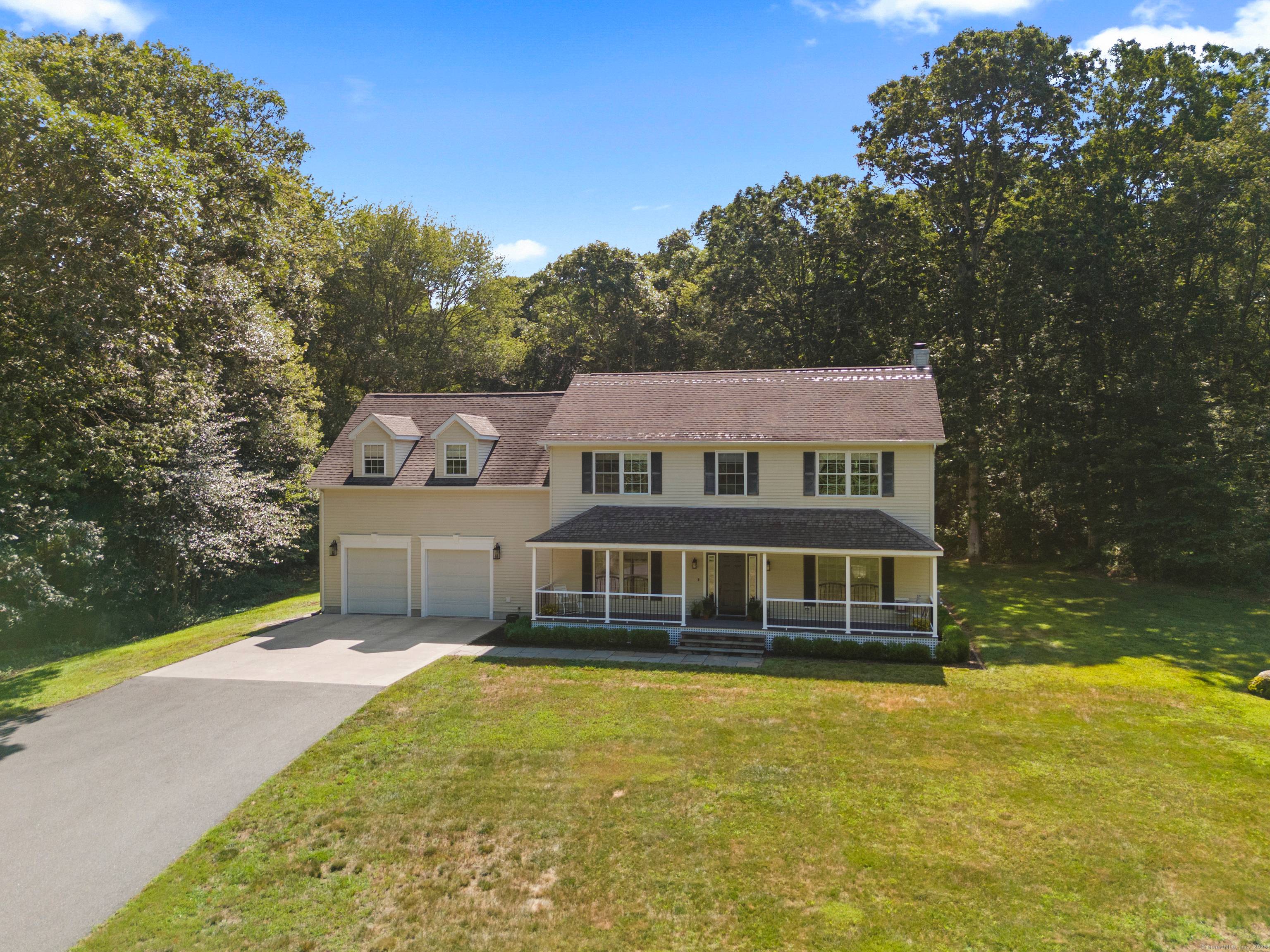 Welcome to 51 2 Rowland. This sun filled, picture perfect colonial in a meadow like setting and framed by woodlands.