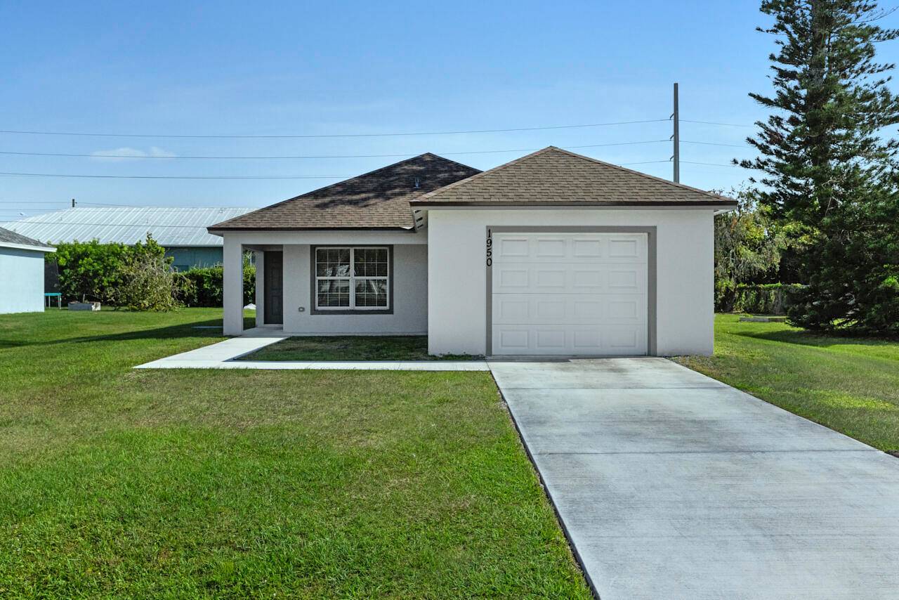 Built in 2022, this beautifully maintained home offers 3 bedrooms, 2 bathrooms, a 1 car garage, and is perfectly located in the heart of Port St.
