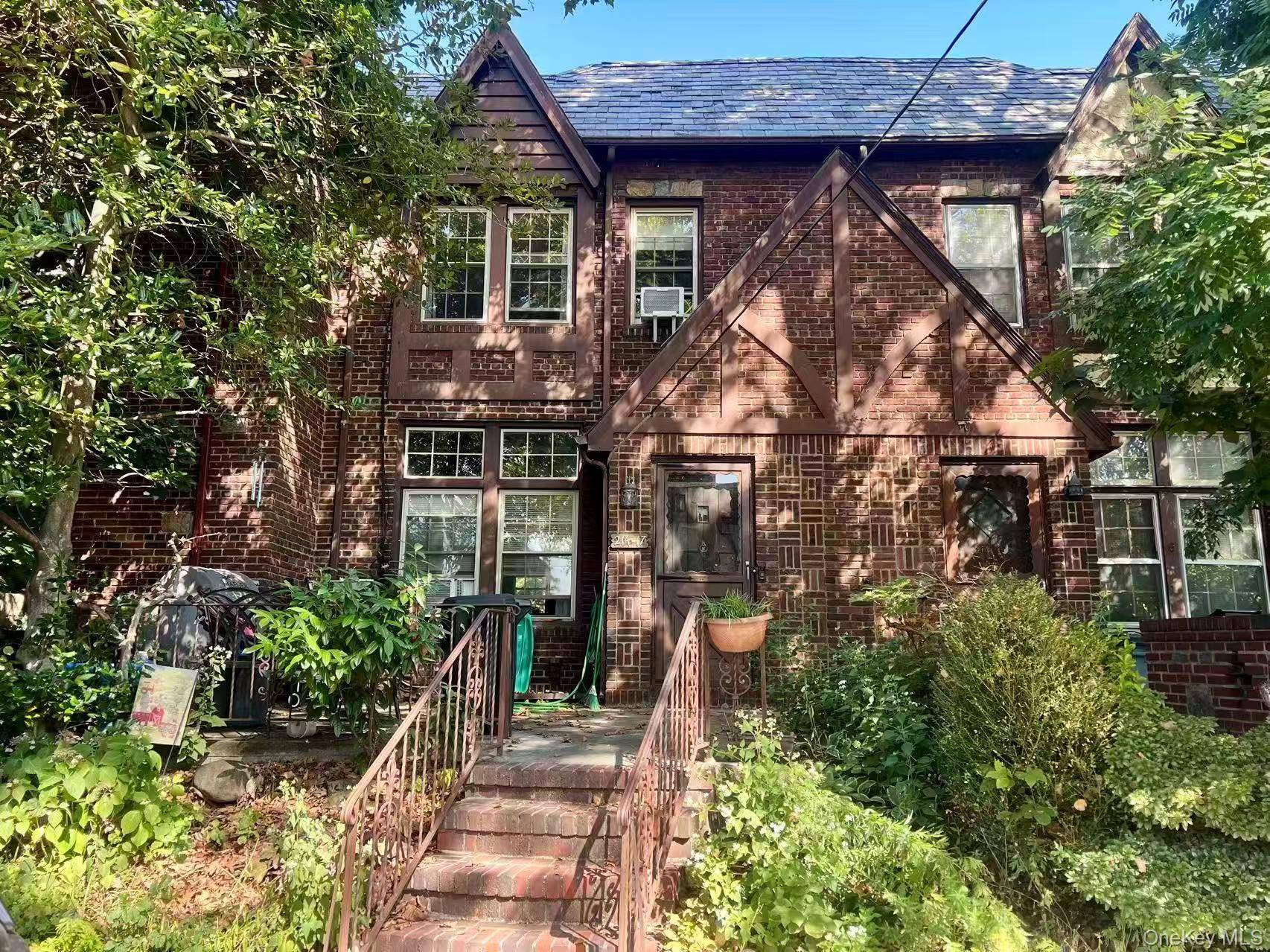 This beautiful Bayside one family Tudor townhouse retains the character and charm of its original architecture, boasting beautiful high ceilings and hardwood floors throughout.