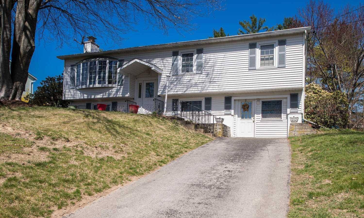 Welcome to this spacious 4 bedroom, 2 bath raised ranch in the sought after Rockingham Farms community of Wappingers.