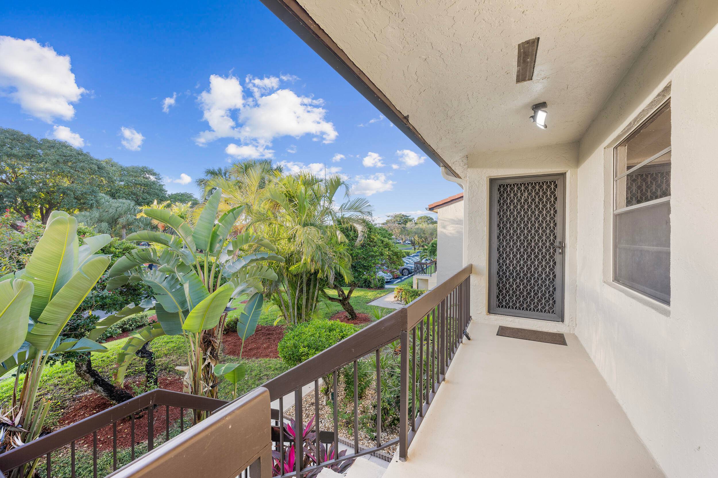 No membership required ! This bright and beautiful condo boasts stunning water and golf course views, overlooking the 4th hole, in the sought after Fairways of Boca Lago.