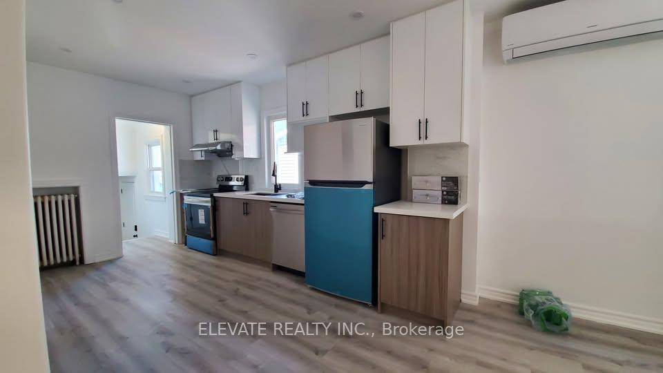 Welcome to this spacious main floor unit in a detached bungalow featuring 4 bedrooms and 1.