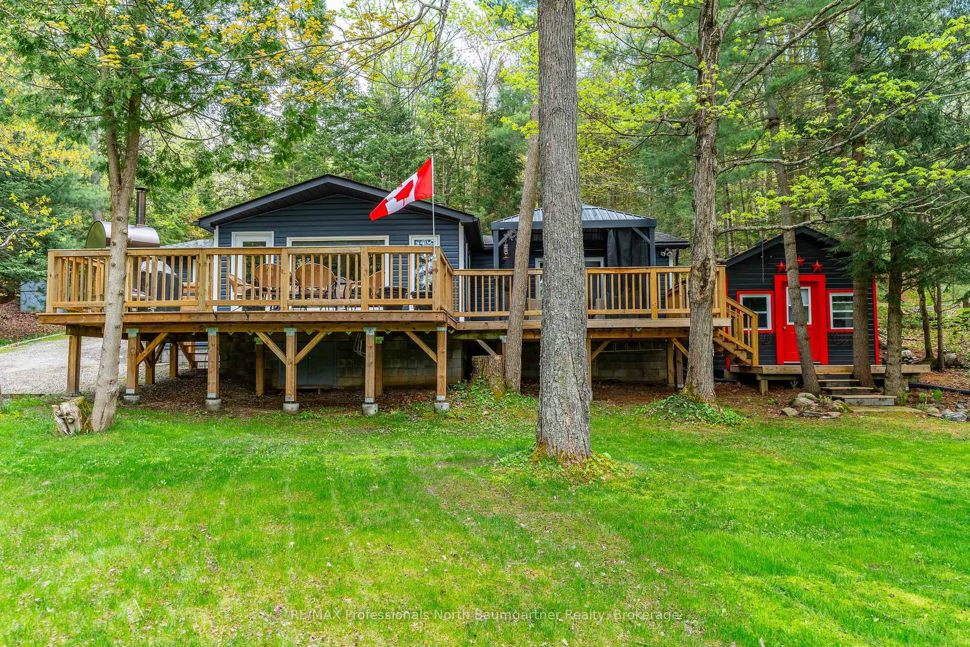 Situated on beautiful Koshlong Lake, this enchanting four season home cottage at 2129 Telephone Bay Road offers the cottage country experience with modern comforts and privacy.