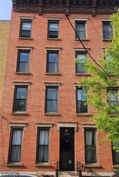 Welcome to this sunlit top floor one bedroom condo, situated in the vibrant heart of downtown Jersey City.