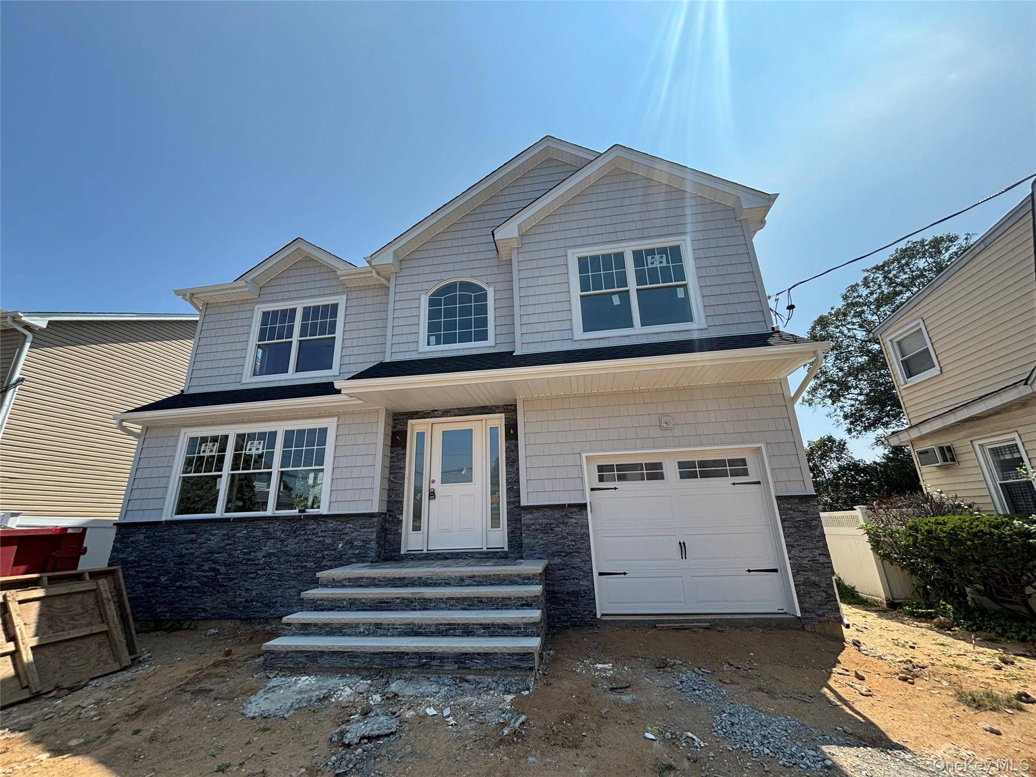 Welcome To This Completely Brand New Construction in Elmont !