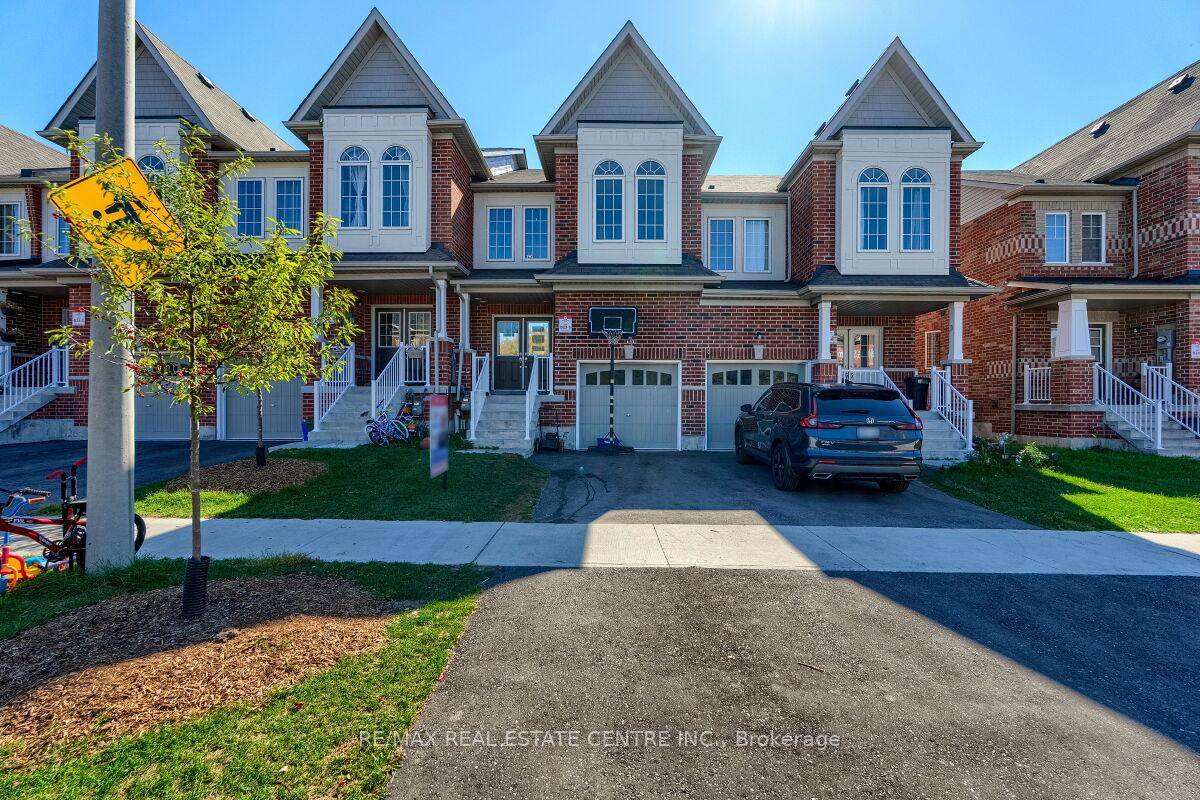 Stunning two story free hold town house offers modern living at its finest.