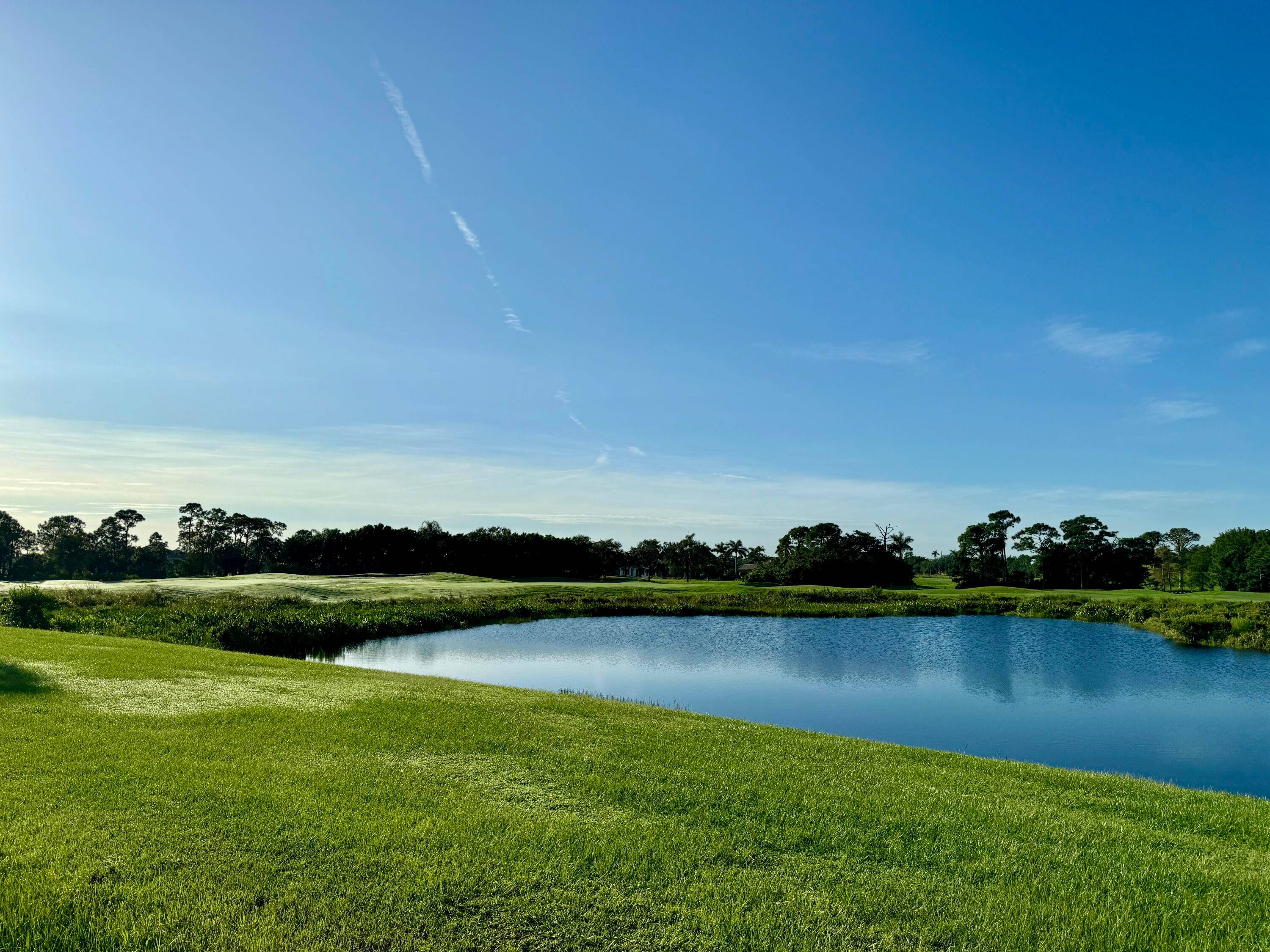 Water to golf views are yours from this idyllic home site on a cul de sac street.