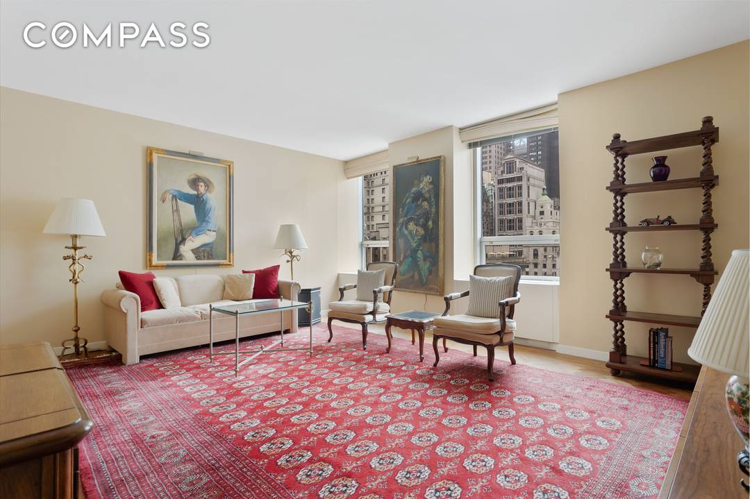PHOTOS ARE VIRTUALLY STAGED Sun splashed 1 bedroom condo located at the prestigious 15 West 53rd Street in the heart of Manhattan.