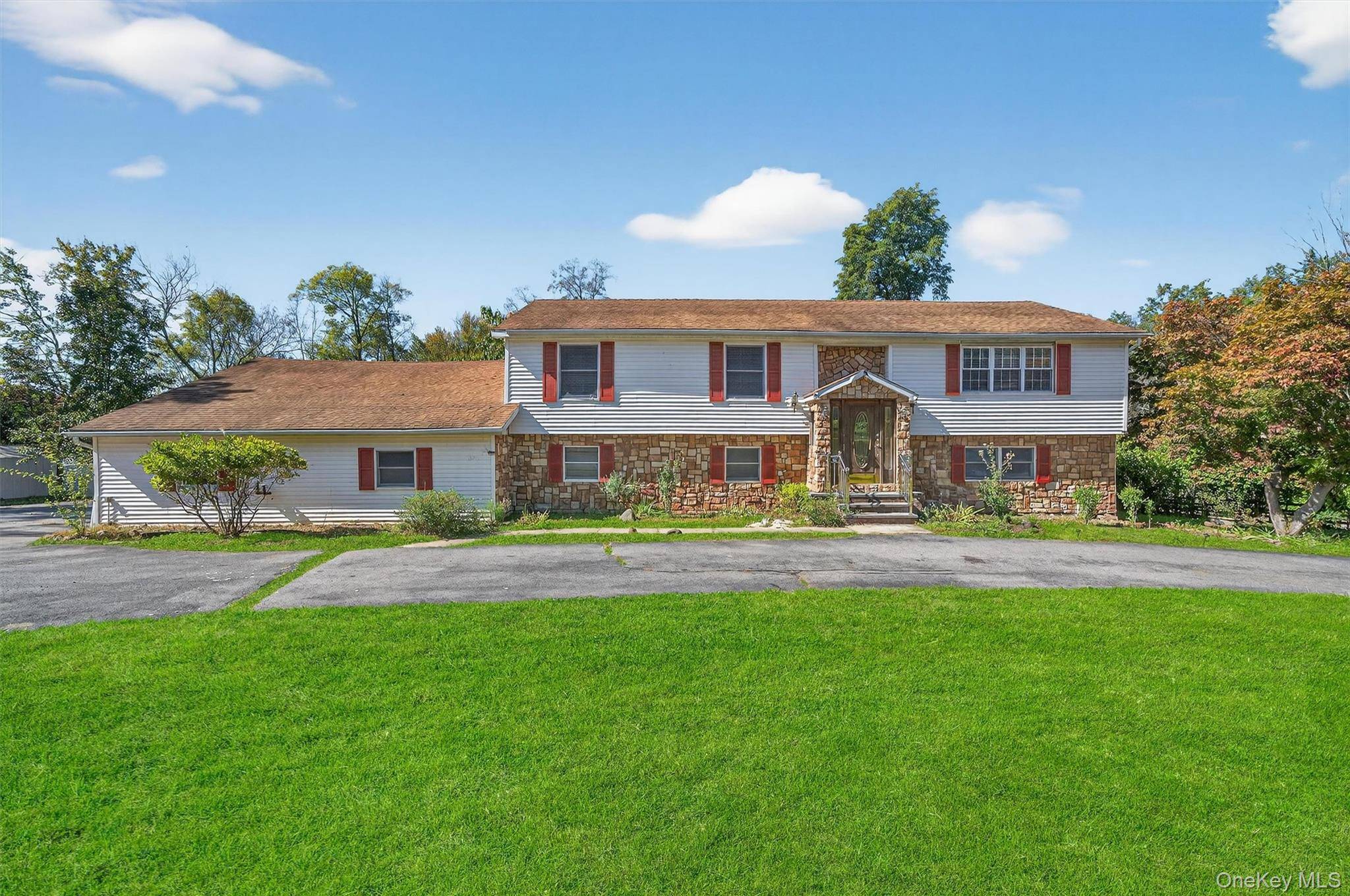 Amazing deal on a massive two family house located on a generous 4.