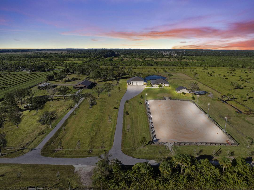 Experience the ultimate blend of luxury living and equestrian excellence on this stunning 36 acre privately gated estate in North St.