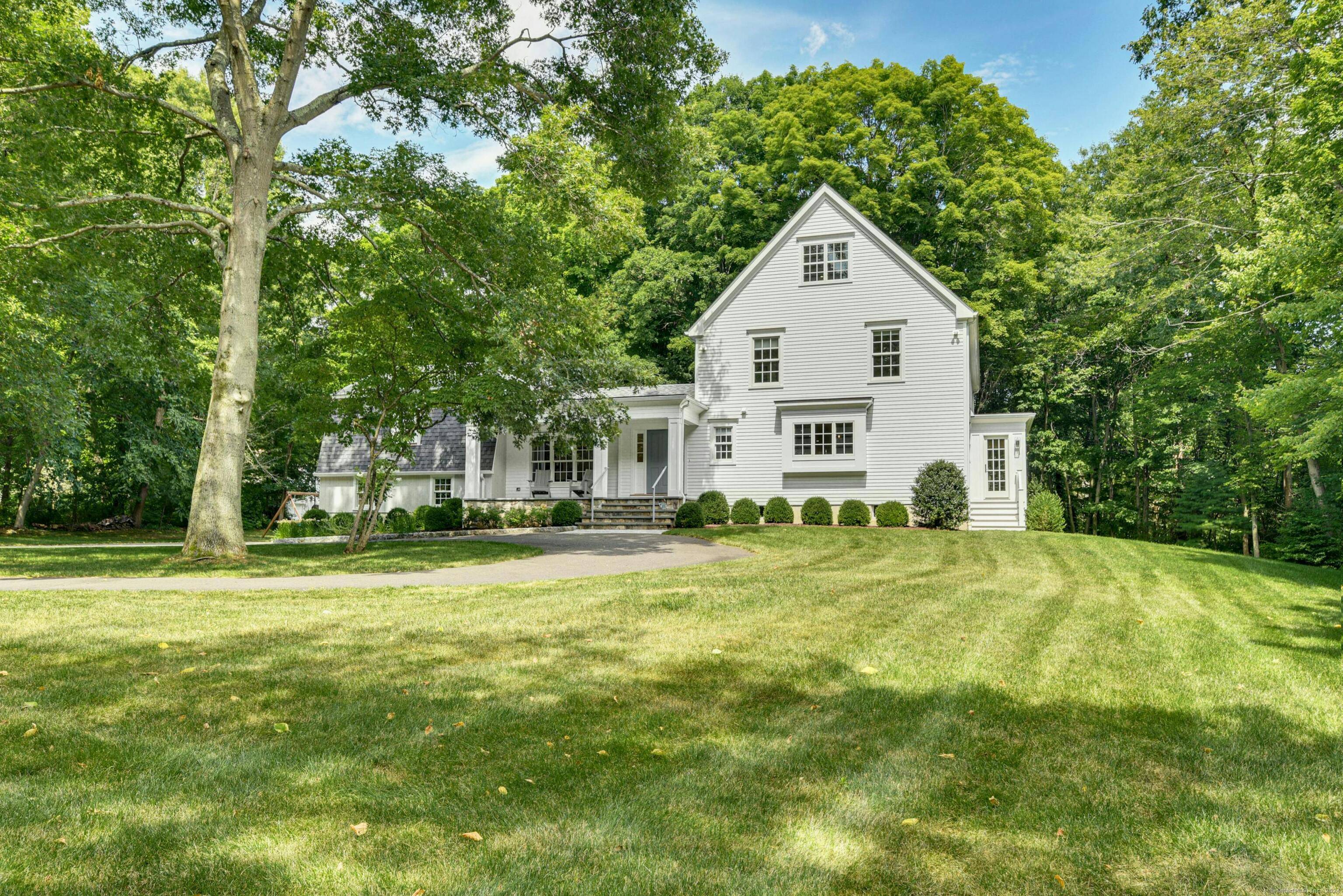 Discover the perfect blend of elegance and modern comfort in this newly renovated home nestled on two serene acres in New Canaan.