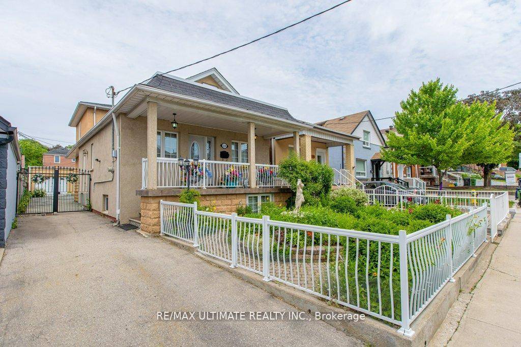 Fabulous bungalow featuring a rear second floor addition, offering a total of over 2, 300 square feet of living space 1, 569 square feet above ground and 800 square feet ...