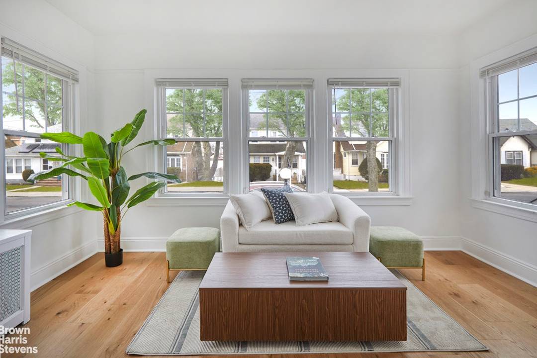 Welcome to this beautifully updated home in the heart of Queens, move in ready and thoughtfully refreshed throughout.