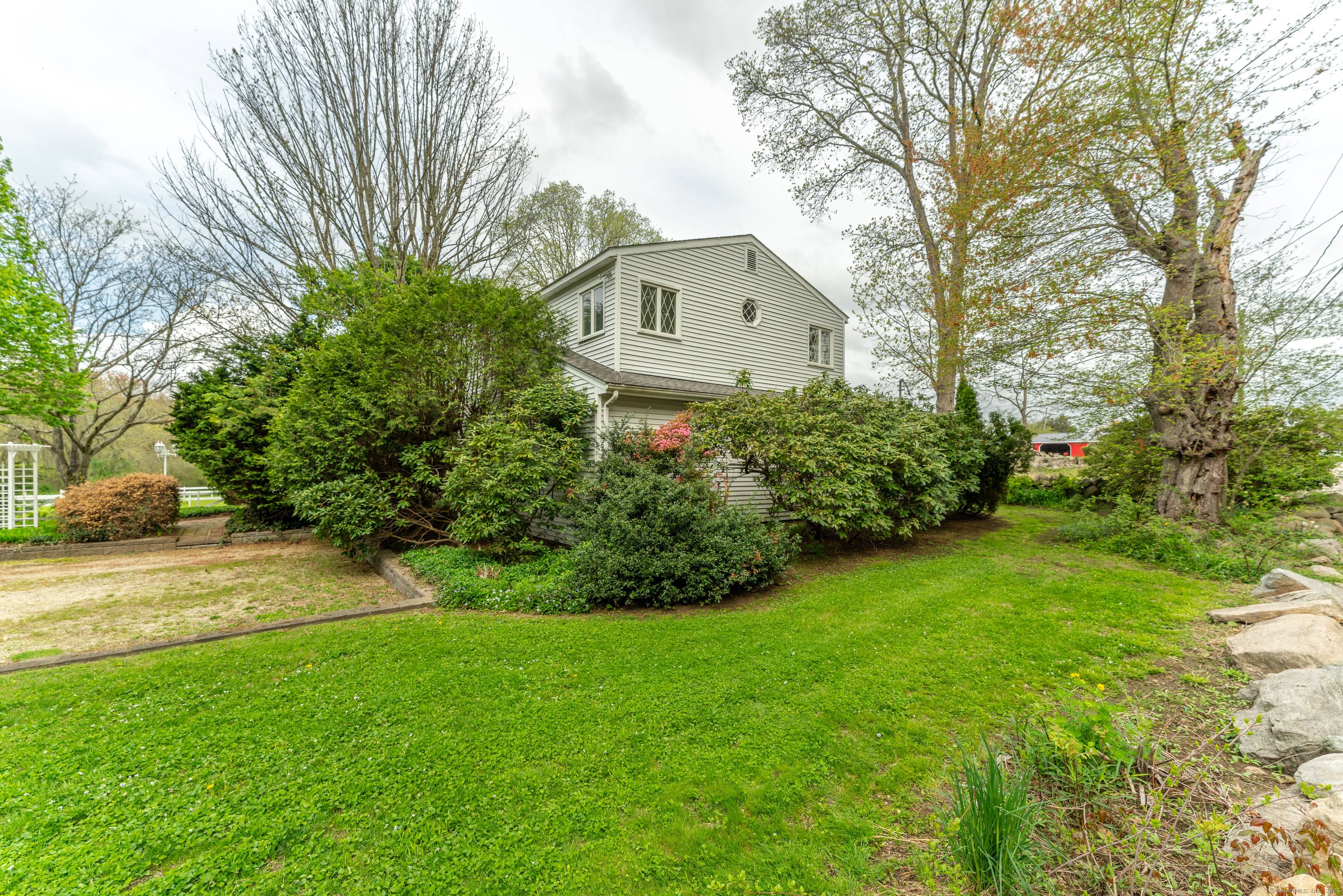 Welcome to 321 North Anguilla Road a hidden gem on a quiet country road in scenic Stonington, CT.