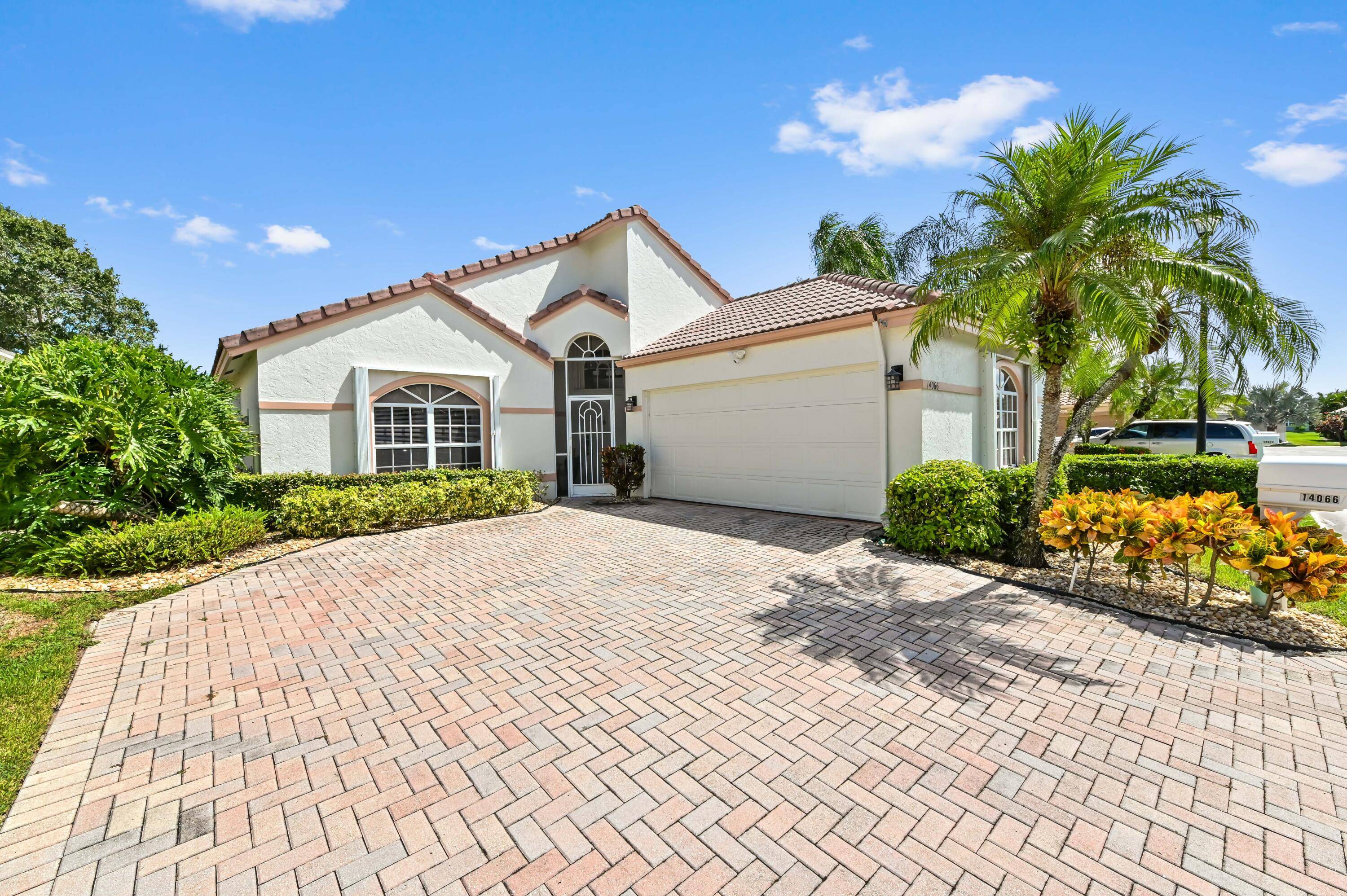 This distinctive model home at 14066 Glenlyon Ct, Delray Beach, FL delivers elegance in every corner, bolstered by a geographically strategic location in the well regarded Newport Cove.