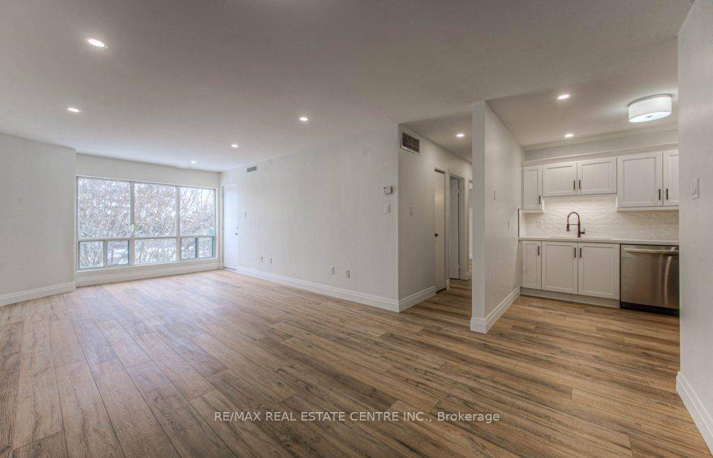STUNNING TOP FLOOR CONDO FOR SALE !