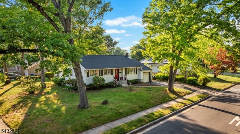 Situated on a corner lot, 53 Mansfield Road is a well maintained, charming home on a quiet, tree lined street.