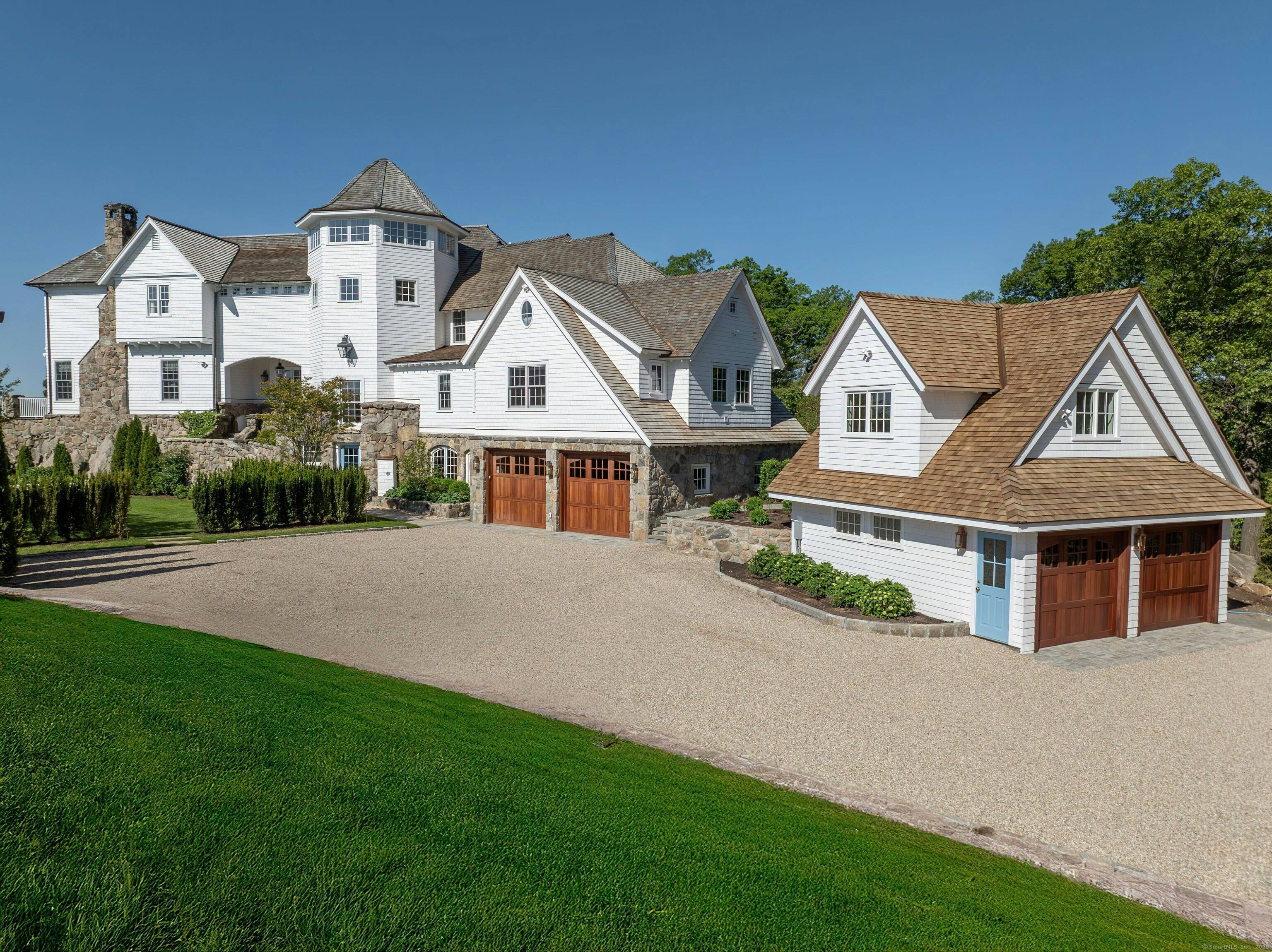 Welcome to 25 Tokeneke Trail, an exceptional waterfront residence in the private Tokeneke Association.