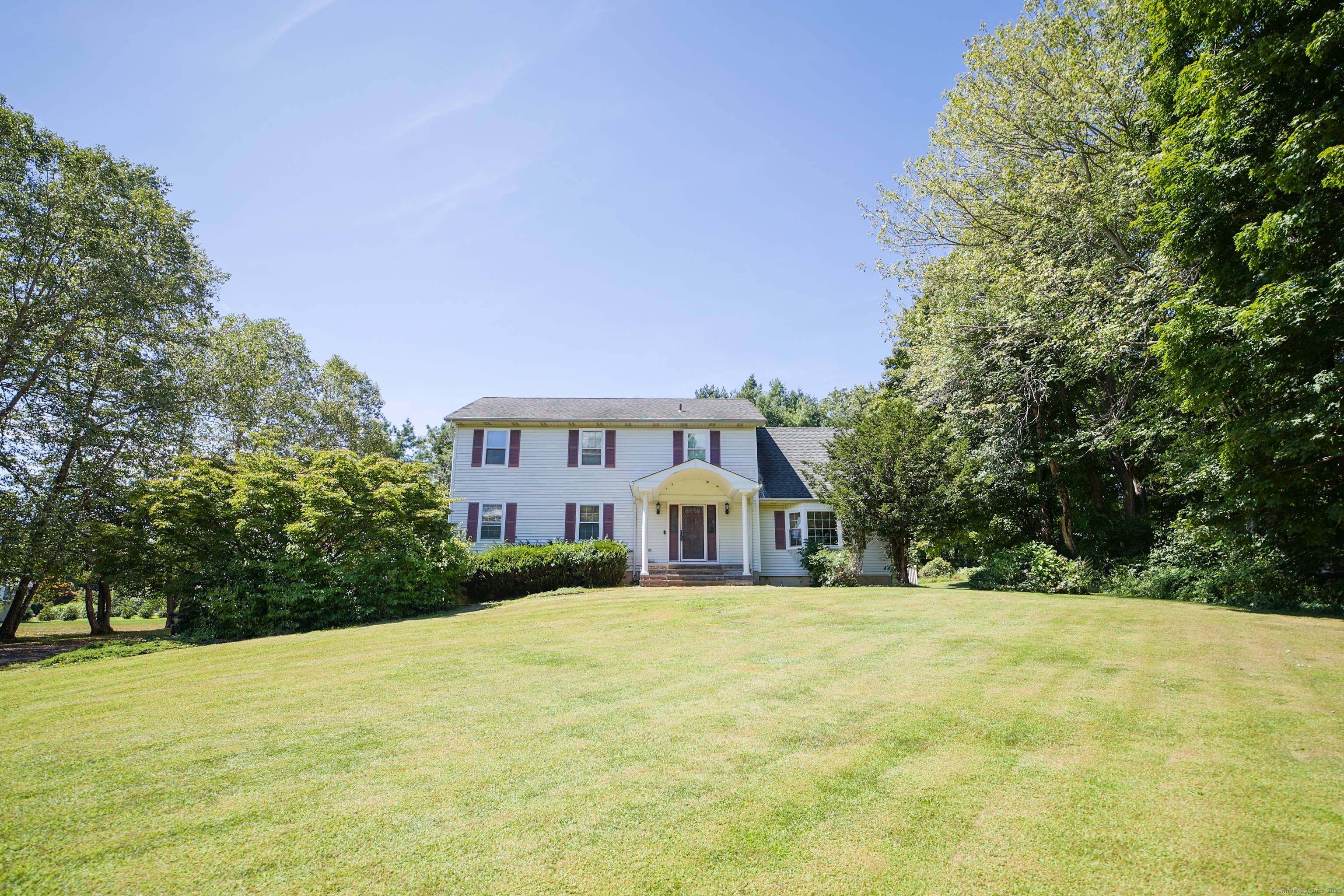 Welcome to this beautiful West Side 4 bedroom center hall colonial in desirable New Fairfield.