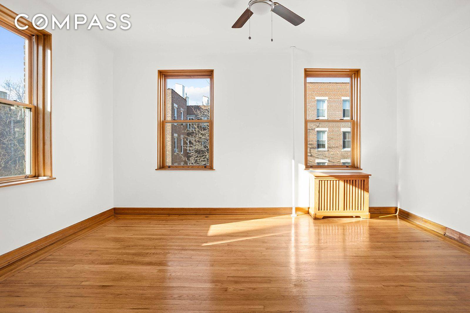 Sunny, open sky outlooks and fine architectural details run throughout this lovely one bedroom, one bathroom home at The Hampton Court, one of Jackson Heights' most celebrated garden cooperatives.