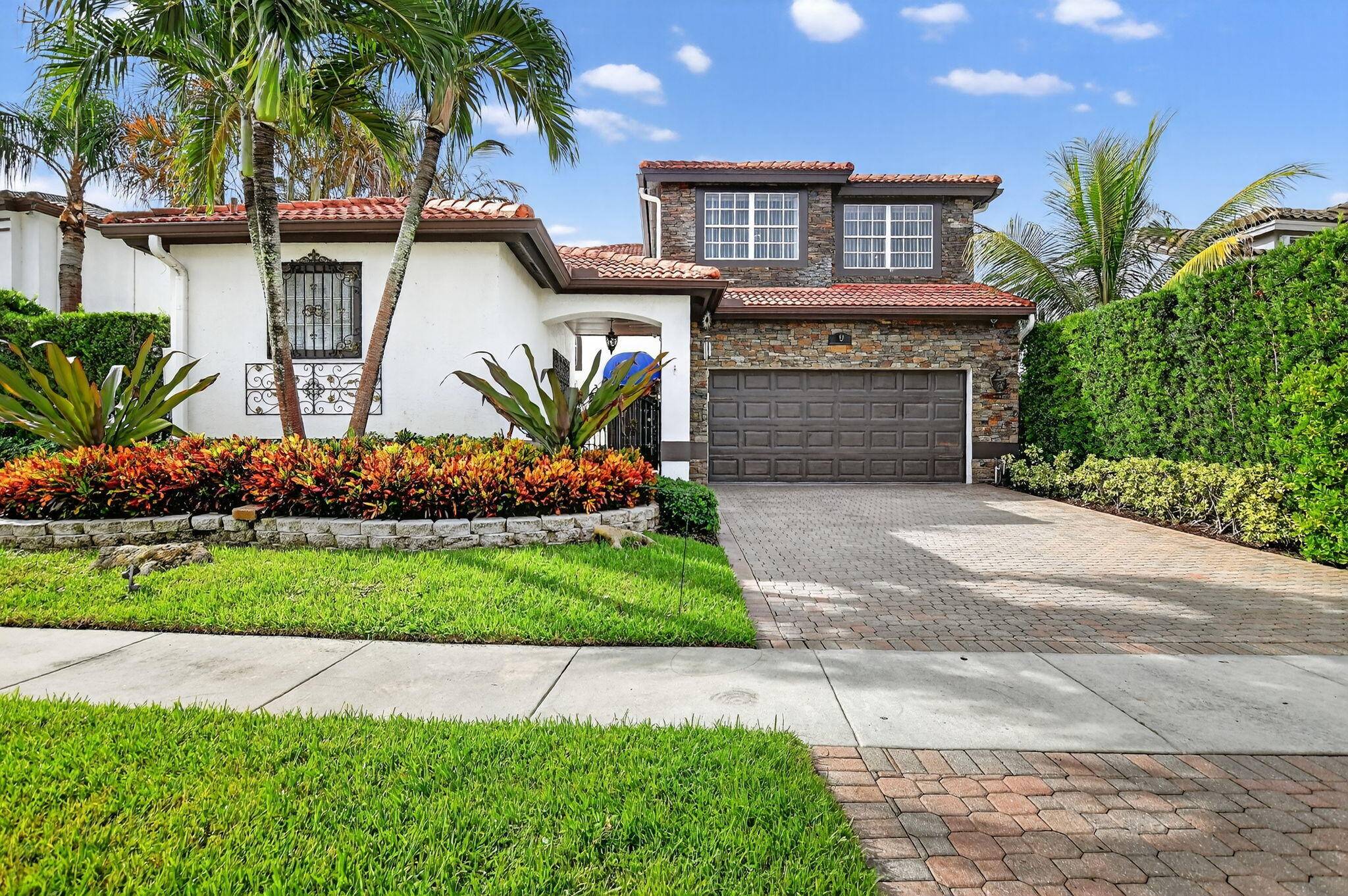 ENJOY FLORIDA LIFESTYLE AT IT'S BEST THIS BEAUTIFUL IMMACULATE 4 BEDROOM, 3.