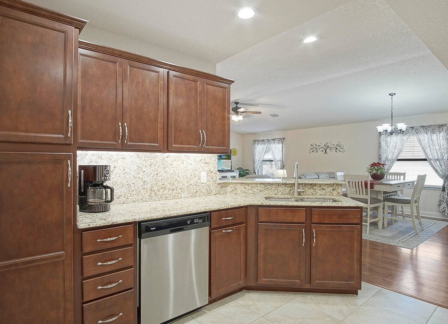 LAND OWNED ! Charming, Move In Ready CBS Home in the Highly Desirable Spanish Lakes Country Club.