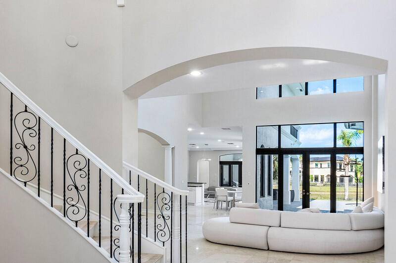 ANNUAL RENTAL ! Welcome to 17895 Cadena Drive, a stunning lakefront estate in the heart of Boca Raton.